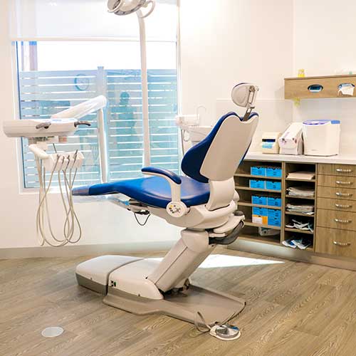 Modern dental room with chair and equipment at Cross Road Dental