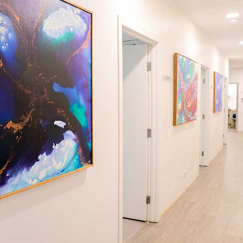 Contemporary dental waiting area with modern seating at Cross Road Dental