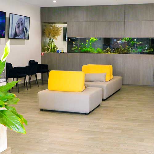 Modern dental waiting area with spacious seating at Cross Road Dental